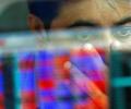 Sensex ends in red after choppy trade