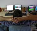 Sensex ends flat after choppy session