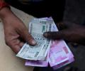 Rupee free fall continues, plunges to new life low of 71.21/$