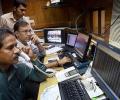 Sensex, Nifty end flat in volatile trade; RIL hits fresh peak