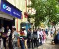 SBI to pick up 49% stake in Yes Bank