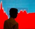 Losses in index majors drag Sensex, Nifty down