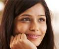 Review: Freida Pinto charms a tall dark stranger