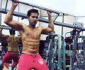 Varun Dhawan flaunts his six-pack abs