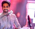 Why is Ayushmann taking piano lessons?