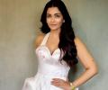 Where is Aishwarya travelling?