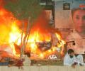 Blasts rock Bhutto's convoy, 165 dead