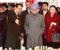 Dr Singh visits Olympic village in Beijing