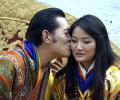 PIC: Bhutan king seals wedding with Royal Kiss