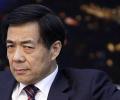 China suspends top leader over murder charges