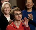 US lawmaker Giffords quits amidst tears