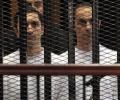 Mubarak's sons, ex-Egypt PM acquitted in corruption case