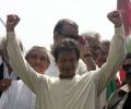 'Go Nawaz go' chants ring louder as protesters stage sit-in outside Pak PM's home