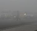 Cold wave sweeps North India; dense fog delays trains, flights