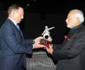 Modi presents Sikh battalion's prized trophy to Abbott at War Memorial