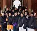 After black umbrellas, TMC brings black shawls to Parliament