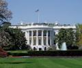 Man held for attempting to climb White House barrier