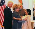 New grandparents Clintons keep their date with Modi