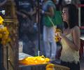 Bombed Brahma temple in Bangkok reopens