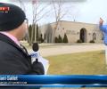 Reporter sees bank robbery on live TV