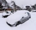 PHOTOS: Snow, rain, ice cover UK in wintry mess