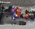 Sunk cruise ship in China cut open but no survivors found