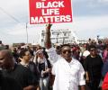 On Selma anniversary, thousands march to mark 'Bloody Sunday'