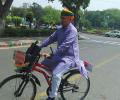 Unfazed by ridicule, this MP continues to cycle to Parliament