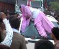 Woman smashes SP leader's car after his guard winked at her