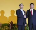 Presidents of China, Taiwan start historic meeting with handshake