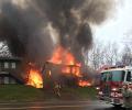 US: 9 killed as plane crashes into apartment in US