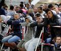 Thousands pour into Germany as migrant crisis intensifies