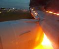 Narrow escape for 240 passengers as Singapore Airlines jet catches fire