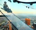 Taking a ride on a 1,000-foot-high glass skyslide