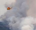 Canadian wildfires grow tenfold; rescuers pray for rain