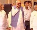 Farooq Abdullah draws flak for using phone during national anthem