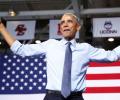 Ahead of polls, Obama's popularity soars to high of 56%