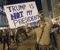 'NOT MY PRESIDENT' protests rage on for 4th day in America