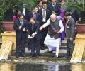 Modi in Vietnam: From feeding fish to praying at Pagoda