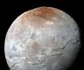 Pluto 'paints' its largest moon red: NASA