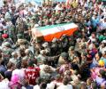 PHOTOS: Nation bids tearful adieu to its fallen heroes