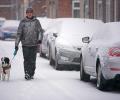 PHOTOS: Snow bomb hits UK, road, air travel disrupted