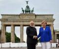 PM poses with Merkel at Brandenburg Gate before leaving Berlin