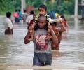 UN chief asks nations to commit to Paris deal amid 'dramatic floods'