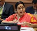 India ready to work above and beyond Paris deal: Swaraj