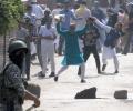 Violence mars Eid in Kashmir; Farooq Abdullah heckled