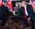 Kim vows complete denuclearisation at historic summit with Trump