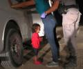 This image of a migrant child went viral. Here's the story behind it