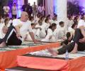 Netas roll out mats for Yoga Day