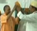 WATCH: Yogi does a Modi, refuses to wear Muslim cap